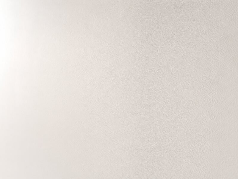 Flawless smooth white wall surface achieved with Ambhuti Wall Putty